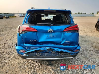 Zdjęcie 6 z 12 samochodu: 2018 TOYOTA RAV4 HYBRID LE VIN:JTMRJREV5JD238837 - miniatura