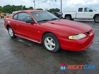 Czwarte zdjęcie samochodu z boku: 1998 FORD MUSTANG VIN:1FAFP4044WF194141 - miniatura