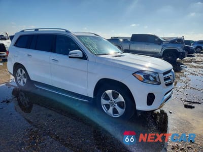 Czwarte zdjęcie samochodu z boku: 2017 MERCEDES-BENZ GLS 450 4MATIC VIN:4JGDF6EE9HA945814 - miniatura
