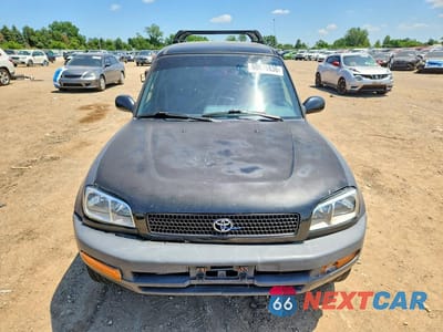 Piąte zdjęcie samochodu w środku: 1997 TOYOTA RAV4 BASE VIN:JT3GP10V0V0013449 - miniatura