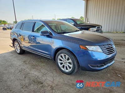 Czwarte zdjęcie samochodu z boku: 2018 LINCOLN MKT VIN:2LMHJ5FK5JBL00753 - miniatura