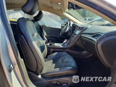 Zdjęcie 7 z 12 samochodu: 2016 FORD FUSION TITANIUM HEV VIN:3FA6P0RU1GR190189 - miniatura