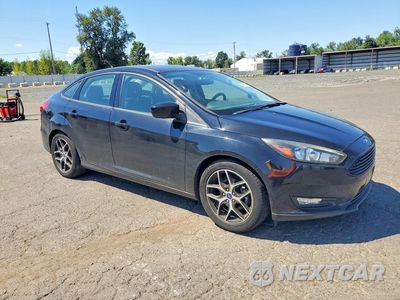Czwarte zdjęcie samochodu z boku: 2018 FORD FOCUS SE VIN:1FADP3FE6JL313805 - miniatura