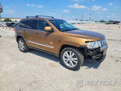 Czwarte zdjęcie samochodu z boku: 2011 JEEP GRAND CHEROKEE LAREDO VIN:1J4RR4GG8BC675677 - miniatura