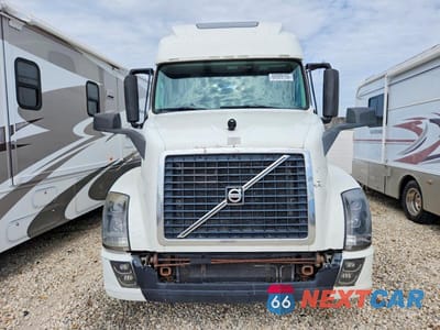 Zdjęcie 14 z 14 samochodu: 2016 VOLVO VNL SEMI TRUCK VIN:4V4NC9EH1GN942026 - miniatura