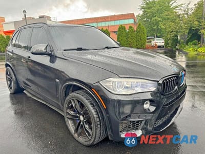 Czwarte zdjęcie samochodu z boku: 2016 BMW X5 M VIN:5YMKT6C52G0R79421 - miniatura