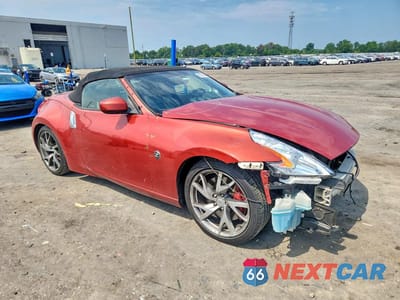 Czwarte zdjęcie samochodu z boku: 2014 NISSAN 370Z ROADSTER VIN:JN1AZ4FH2EM620138 - miniatura