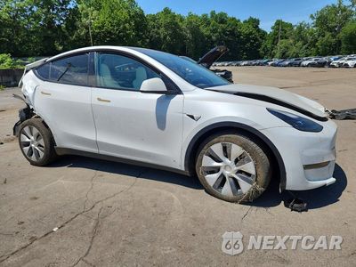 Czwarte zdjęcie samochodu z boku: 2023 TESLA MODEL Y VIN:7SAYGDEE7PA172239 - miniatura