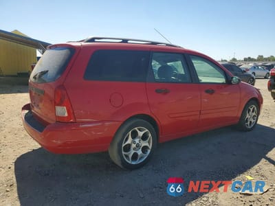 Trzecie zdjęcie samochodu z tyłu: 2002 FORD FOCUS SE VIN:1FAFP36372W150699 - miniatura