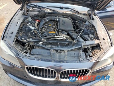 Zdjęcie 11 z 12 samochodu: 2013 BMW 740 LI VIN:WBAYE4C58DD136987 - miniatura