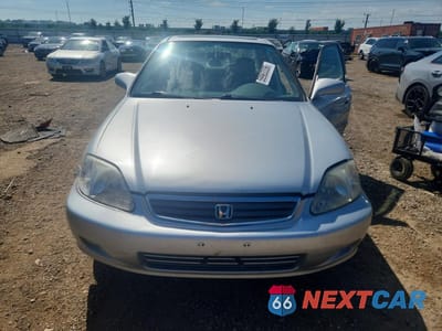Piąte zdjęcie samochodu w środku: 1999 HONDA CIVIC EX VIN:1HGEJ8647XL022020 - miniatura