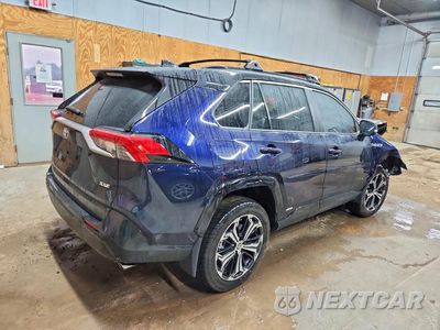 Trzecie zdjęcie samochodu z tyłu: 2024 TOYOTA RAV4 PRIME XSE VIN:JTMEB3FVXRD216920 - miniatura