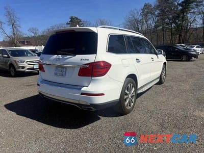Czwarte zdjęcie samochodu z boku: 2014 MERCEDES-BENZ GL 450 4MATIC VIN:4JGDF7CE9EA314971 - miniatura
