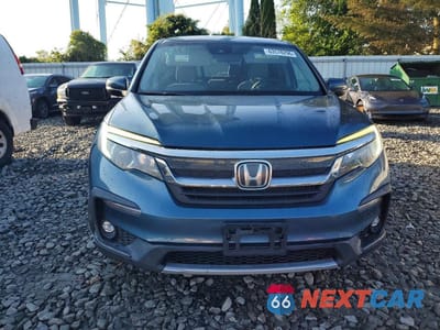 Piąte zdjęcie samochodu w środku: 2020 HONDA PILOT EX VIN:5FNYF5H3XLB018606 - miniatura