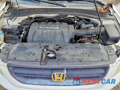 Zdjęcie 12 z 13 samochodu: 2005 HONDA PILOT EXL VIN:2HKYF18755H528510 - miniatura