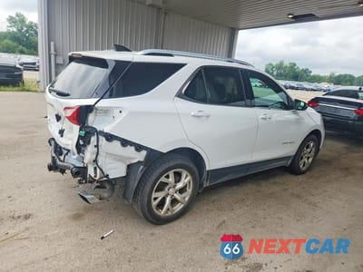 Trzecie zdjęcie samochodu z tyłu: 2020 CHEVROLET EQUINOX LT VIN:2GNAXLEX9L6182338 - miniatura