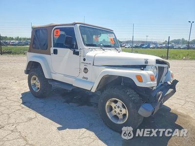 Czwarte zdjęcie samochodu z boku: 2000 JEEP WRANGLER / TJ SAHARA VIN:1J4FA59S0YP773850 - miniatura