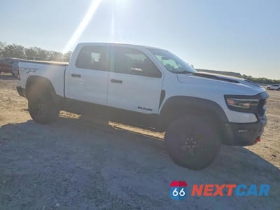 Czwarte zdjęcie samochodu z boku: 2022 RAM 1500 TRX VIN:1C6SRFU9XNN413992 - miniatura