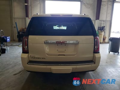 Zdjęcie 6 z 13 samochodu: 2015 GMC YUKON XL DENALI VIN:1GKS2JKJ1FR209724 - miniatura