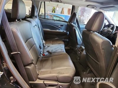 Zdjęcie 11 z 13 samochodu: 2018 HONDA PILOT TOURING VIN:5FNYF5H90JB011956 - miniatura