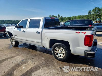 Trzecie zdjęcie samochodu z tyłu: 2018 CHEVROLET SILVERADO K1500 HIGH COUNTRY VIN:3GCUKTEJ3JG220504 - miniatura
