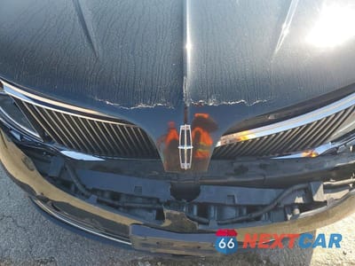 Zdjęcie 11 z 12 samochodu: 2013 LINCOLN MKS VIN:1LNHL9EK7DG604582 - miniatura