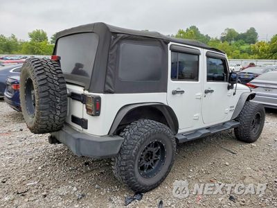 Trzecie zdjęcie samochodu z tyłu: 2013 JEEP WRANGLER UNLIMITED SPORT VIN:1C4BJWDG7DL543074 - miniatura