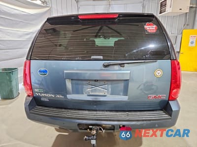 Zdjęcie 6 z 13 samochodu: 2010 GMC YUKON XL K1500 SLT VIN:1GKUKKE30AR177160 - miniatura