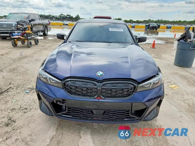 Piąte zdjęcie samochodu w środku: 2026 BMW M340I VIN:WBA53FT07TFW11055 - miniatura