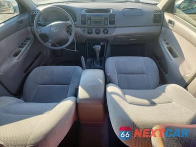 Zdjęcie 8 z 12 samochodu: 2003 TOYOTA CAMRY LE VIN:4T1BE30K03U750276 - miniatura