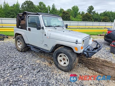 Czwarte zdjęcie samochodu z boku: 2003 JEEP WRANGLER / TJ SE VIN:1J4FA29103P313120 - miniatura