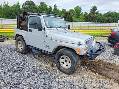 Czwarte zdjęcie samochodu z boku: 2003 JEEP WRANGLER / TJ SE VIN:1J4FA29103P313120 - miniatura