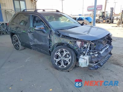 Czwarte zdjęcie samochodu z boku: 2022 TOYOTA RAV4 PRIME XSE VIN:JTMEB3FV3ND107984 - miniatura