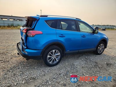 Trzecie zdjęcie samochodu z tyłu: 2018 TOYOTA RAV4 HYBRID LE VIN:JTMRJREV5JD238837 - miniatura