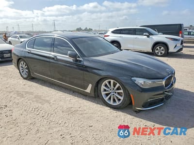 Czwarte zdjęcie samochodu z boku: 2018 BMW 740 I VIN:WBA7E2C5XJG742446 - miniatura