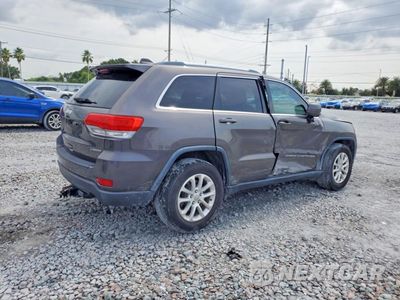 Trzecie zdjęcie samochodu z tyłu: 2014 JEEP GRAND CHEROKEE LAREDO VIN:1C4RJEAGXEC461015 - miniatura
