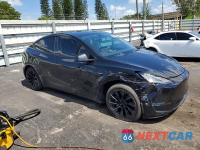Czwarte zdjęcie samochodu z boku: 2022 TESLA MODEL Y VIN:7SAYGDEE2NA006742 - miniatura