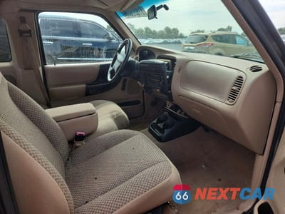 Zdjęcie 11 z 13 samochodu: 1999 FORD RANGER SUPER CAB VIN:1FTYR14V8XPB88482 - miniatura