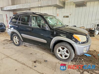 Czwarte zdjęcie samochodu z boku: 2001 TOYOTA RAV4 BASE VIN:JTEHH20V710086522 - miniatura