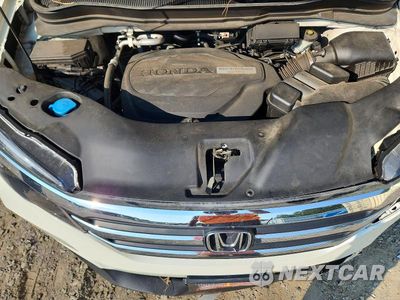 Zdjęcie 12 z 13 samochodu: 2016 HONDA PILOT EXLN VIN:5FNYF5H75GB042997 - miniatura