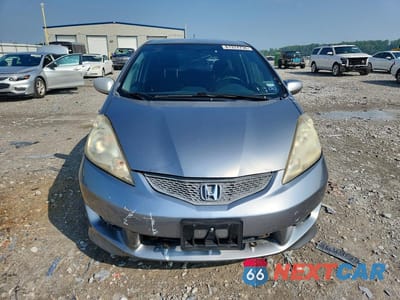 Piąte zdjęcie samochodu w środku: 2010 HONDA FIT SPORT VIN:JHMGE8H63AS021923 - miniatura
