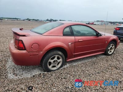 Trzecie zdjęcie samochodu z tyłu: 2002 FORD MUSTANG VIN:1FAFP40422F166719 - miniatura
