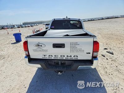Zdjęcie 6 z 12 samochodu: 2021 TOYOTA TACOMA SR5 V6 VIN:3TMBZ5DN9MM031090 - miniatura