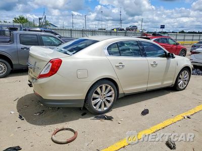 Trzecie zdjęcie samochodu z tyłu: 2015 LINCOLN MKS VIN:1LNHL9FT2FG601647 - miniatura