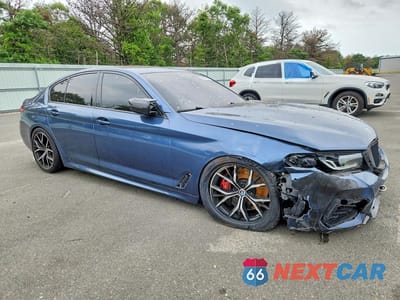 Czwarte zdjęcie samochodu z boku: 2023 BMW M550XI VIN:WBA13BK03PCM16571 - miniatura