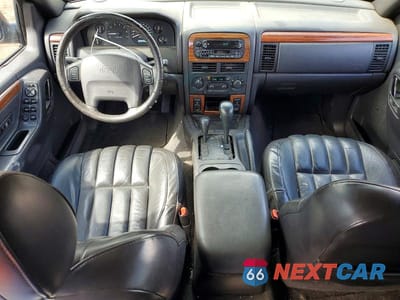 Zdjęcie 8 z 13 samochodu: 1999 JEEP GRAND CHEROKEE LIMITED VIN:1J4GW68N0XC597654 - miniatura