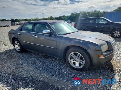 Czwarte zdjęcie samochodu z boku: 2010 CHRYSLER 300 TOURING VIN:2C3CA5CV9AH206501 - miniatura