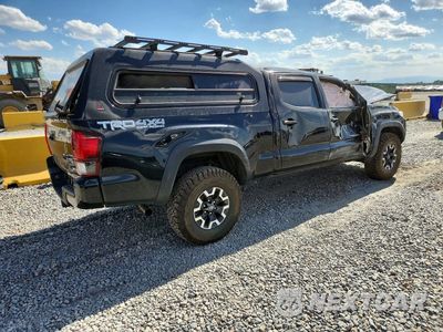 Trzecie zdjęcie samochodu z tyłu: 2019 TOYOTA TACOMA TRD OFF-ROAD VIN:3TMDZ5BN5KM079761 - miniatura
