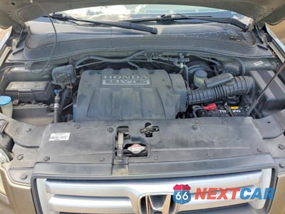 Zdjęcie 12 z 14 samochodu: 2006 HONDA PILOT LX VIN:5FNYF28106B026697 - miniatura