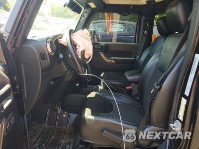 Zdjęcie 7 z 12 samochodu: 2016 JEEP WRANGLER UNLIMITED SAHARA VIN:1C4HJWEG5GL206867 - miniatura